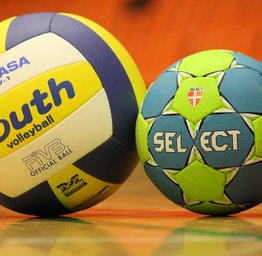 volleyballs on court