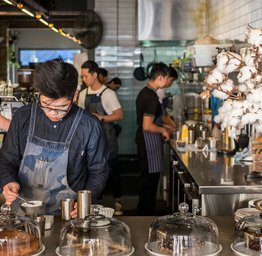 baristas behind the counter