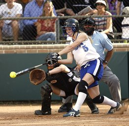 softball player hitting